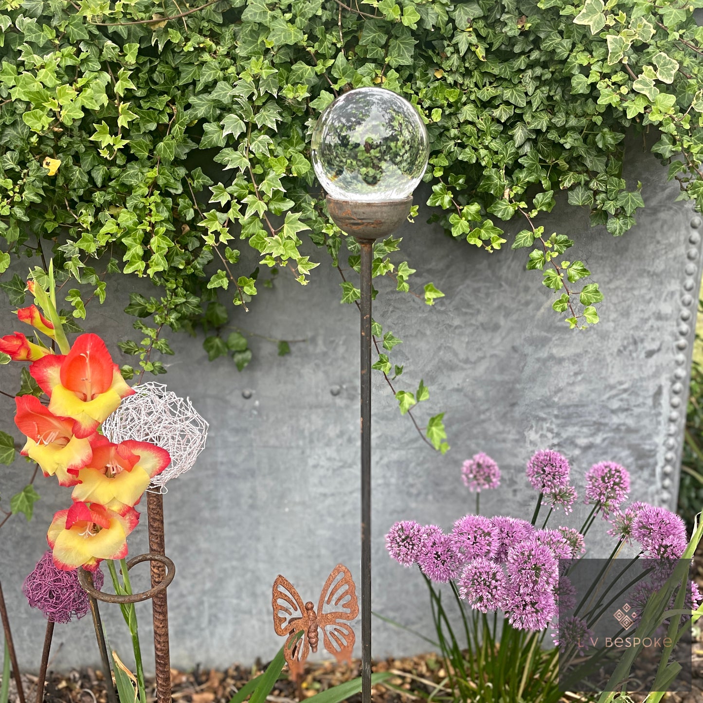 Decorative Glass Finish Metal Garden Stake with a choice of size and style available.