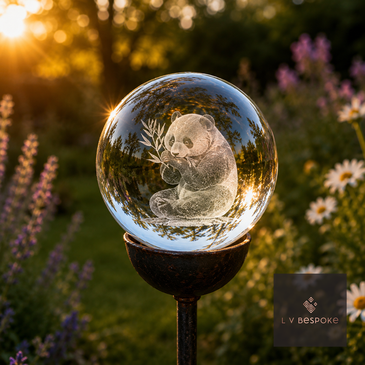 Raw steel garden stake with a clear glass orb holding a 3D Panda design, planted in a border