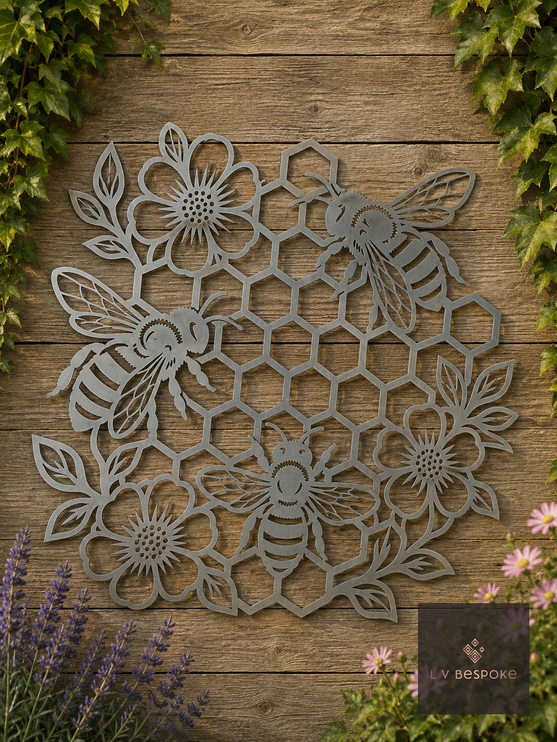 Raw steel Bee & Floral Honeycomb wall art hung on a garden wall