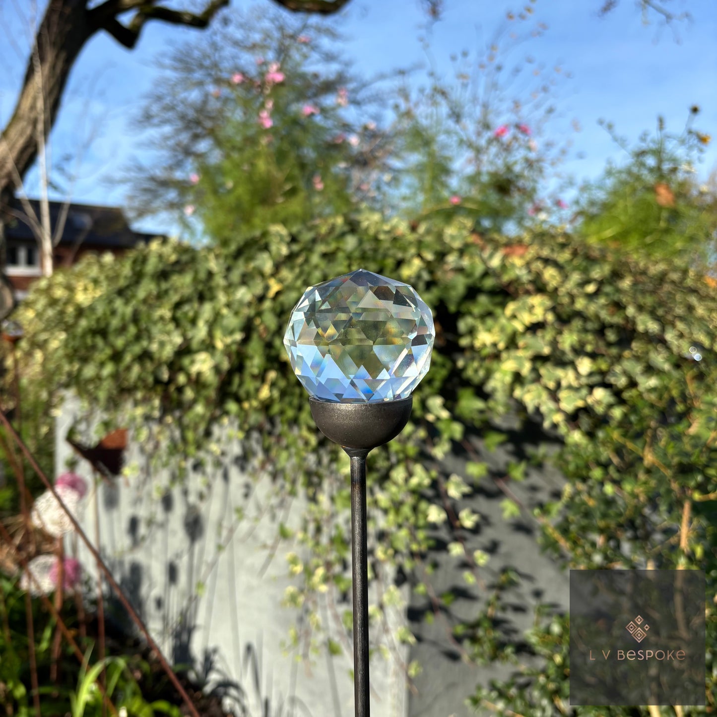 Decorative Glass Finish Metal Garden Stake with a choice of size and style available.