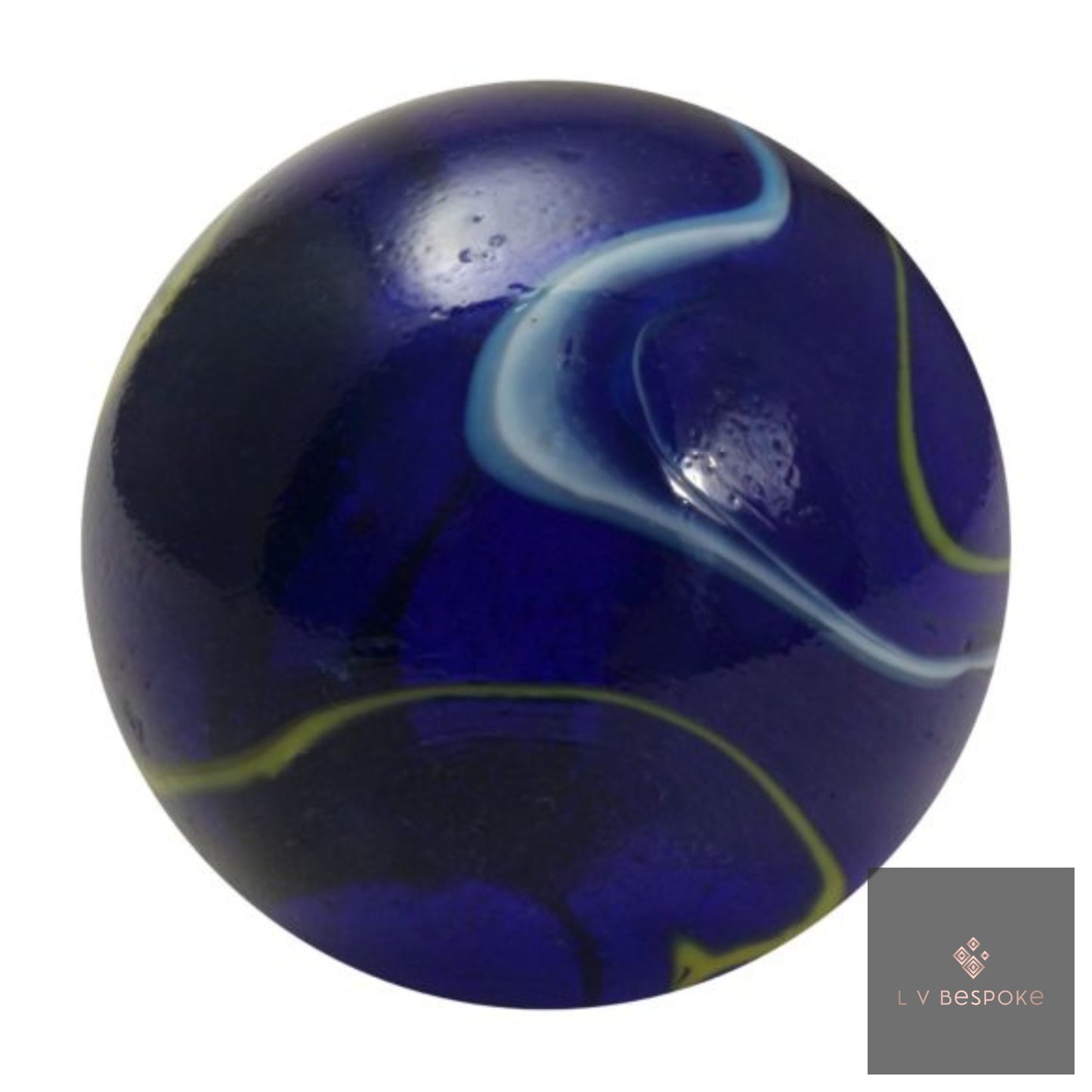 Blue glass marble with white and yellow swirls on a white background