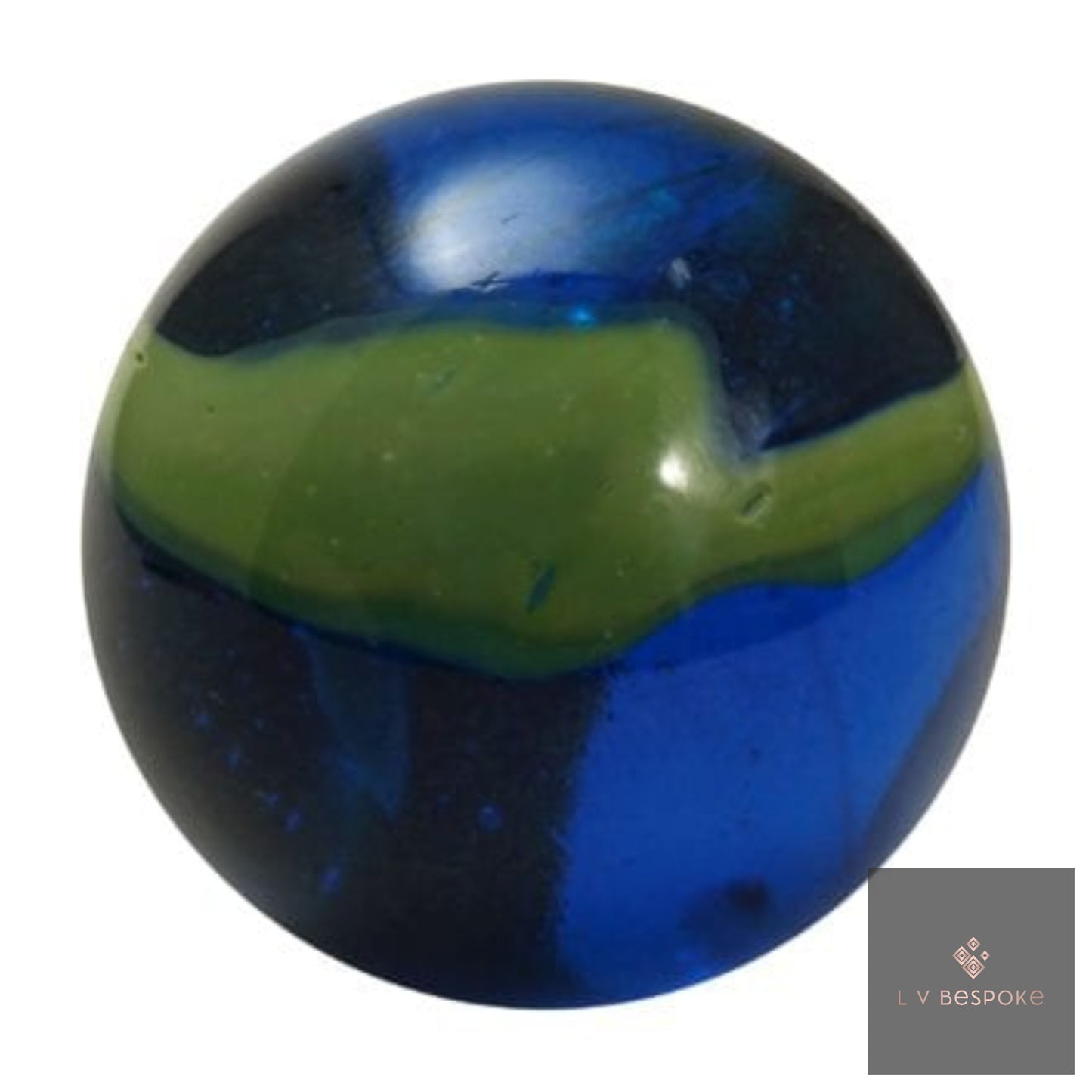 Blue and green glass marble on a white background