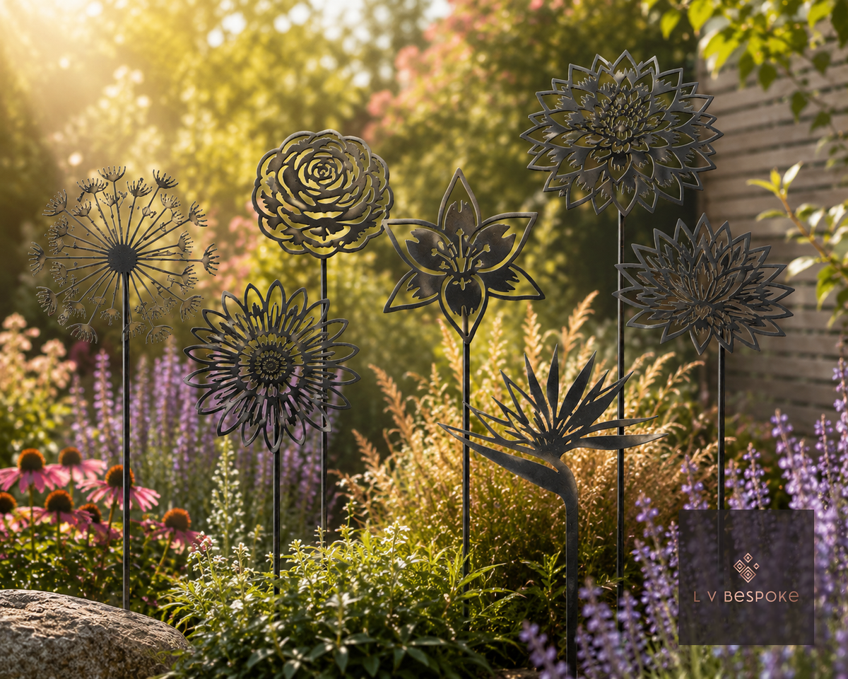 Raw steel flower head on a garden stake, planted in a border