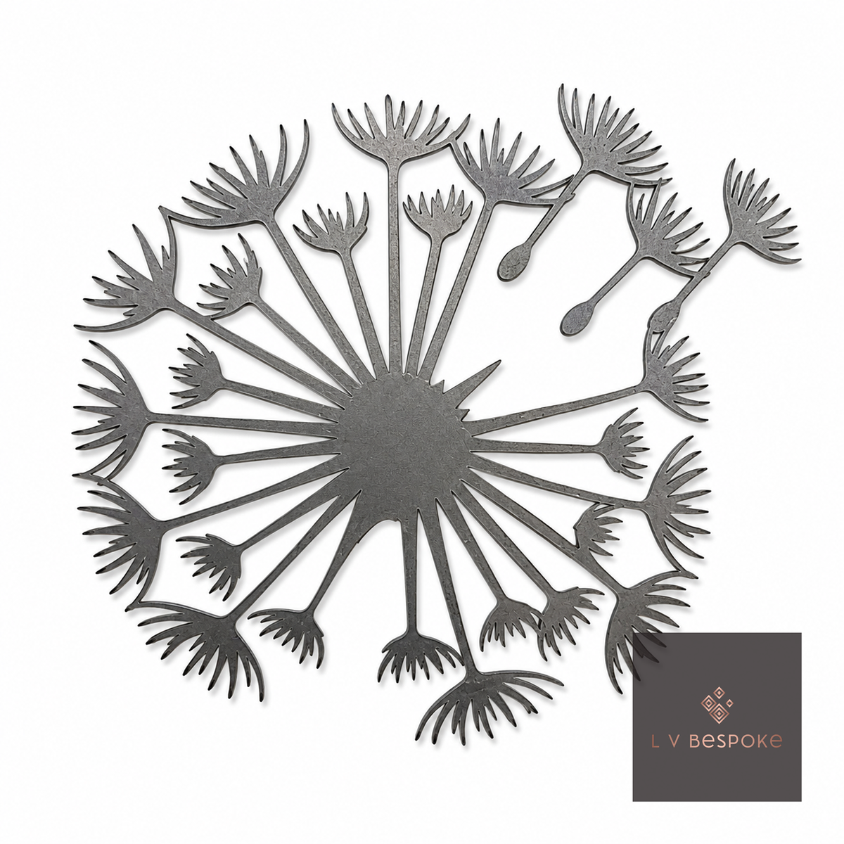 Raw steel Dandelion flower head on a garden stake, planted in a border