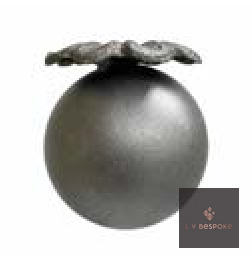 Raw steel Large Poppy Head flower head on a garden stake, planted in a border