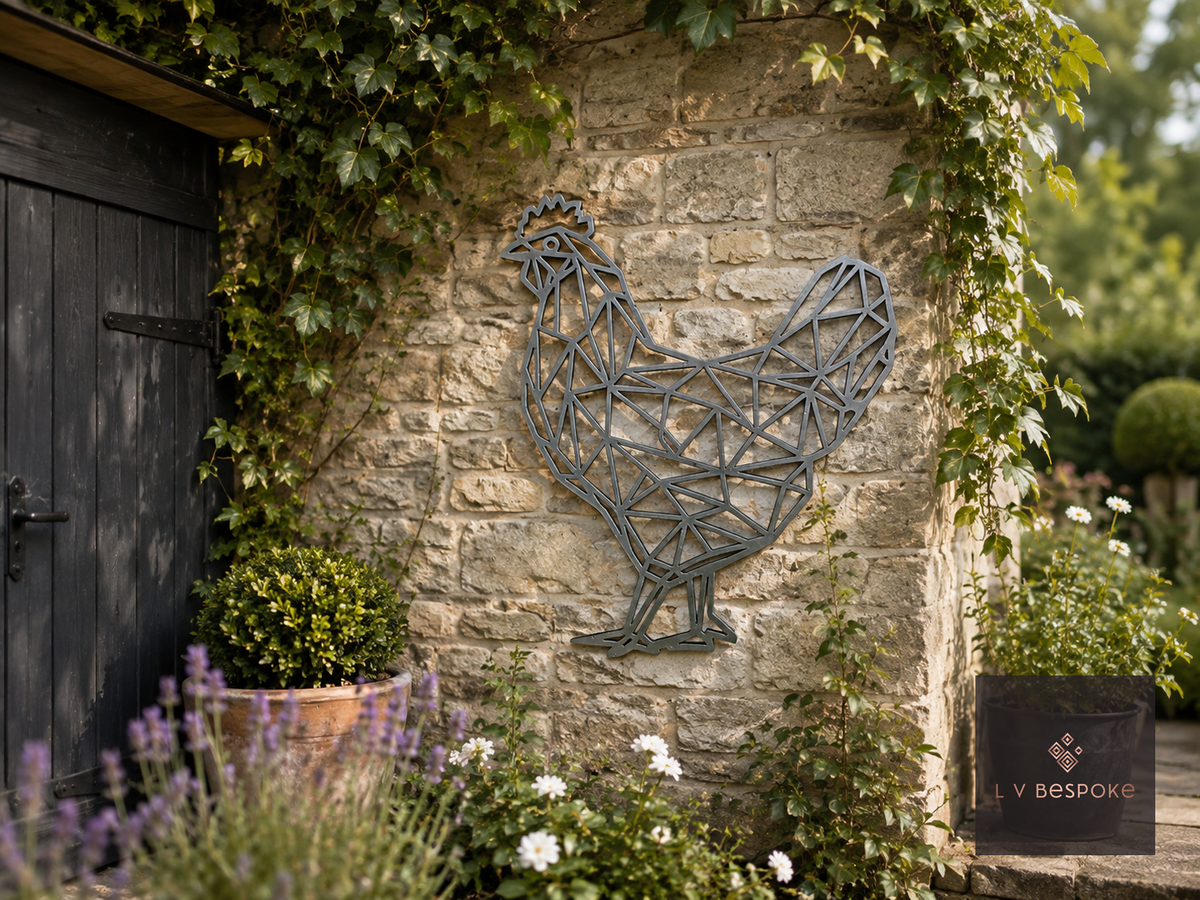 Raw steel geometric Rooster wall art hung on a garden wall