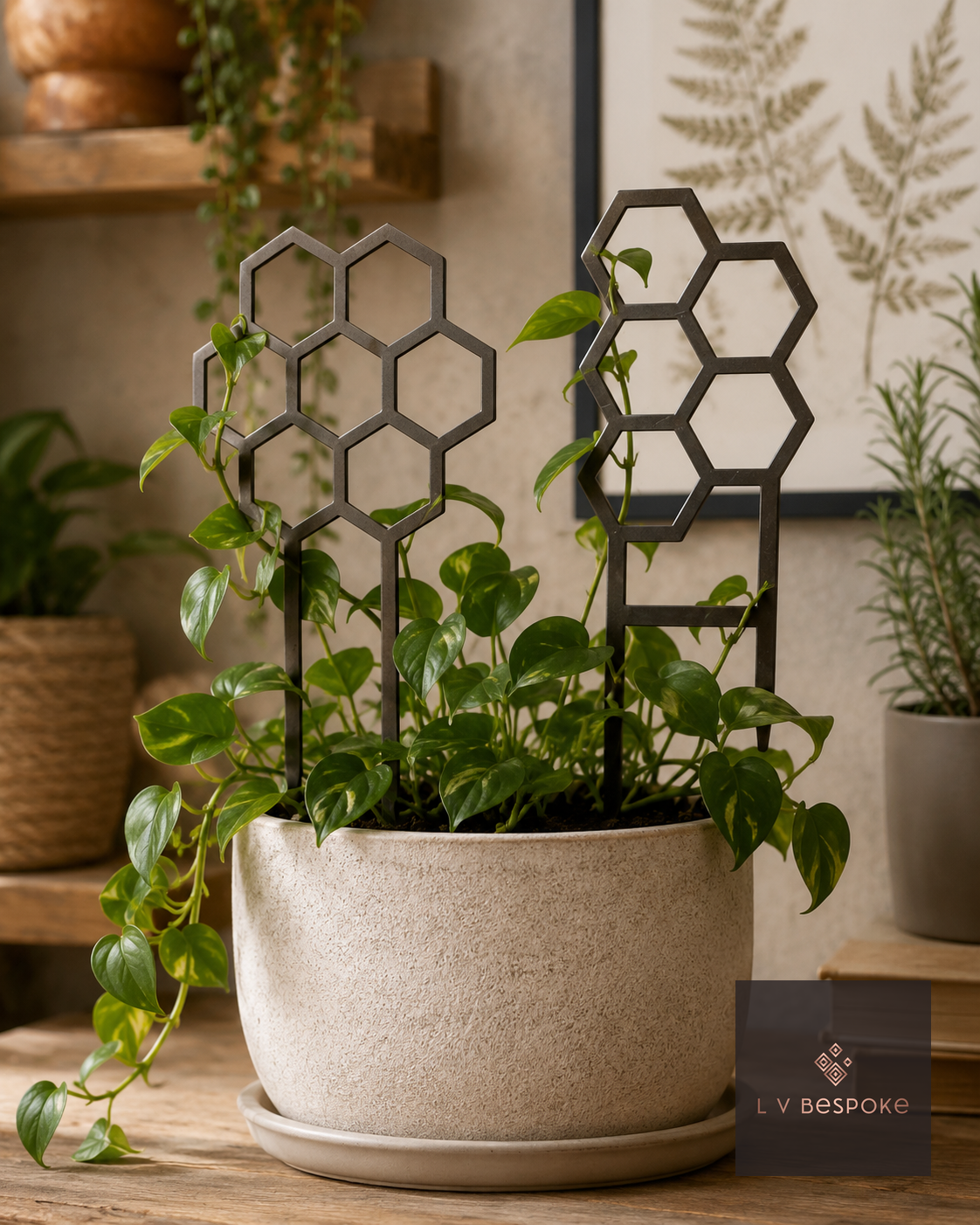 Steel indoor plant support in a houseplant pot