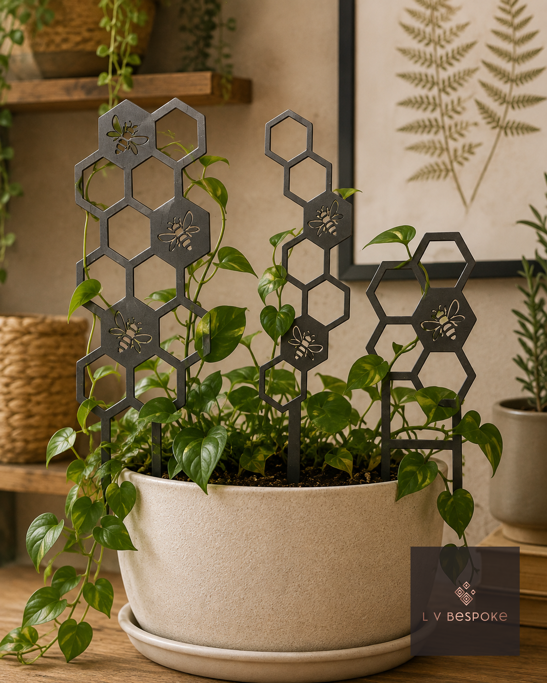 Steel Honeycomb Trellis with Bees indoor plant support in a houseplant pot