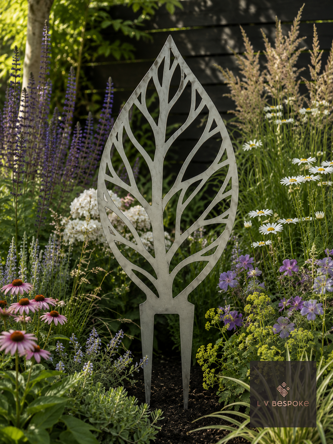 Raw steel Leaf Garden Stake in a garden border or on a wall