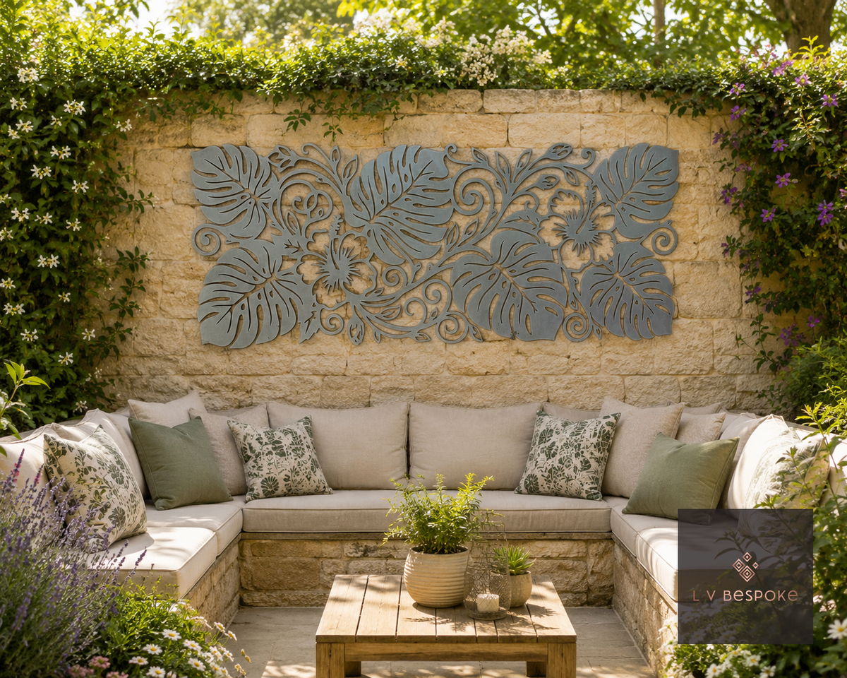 Raw steel Monstera Leaf Panel wall art panel on a garden wall