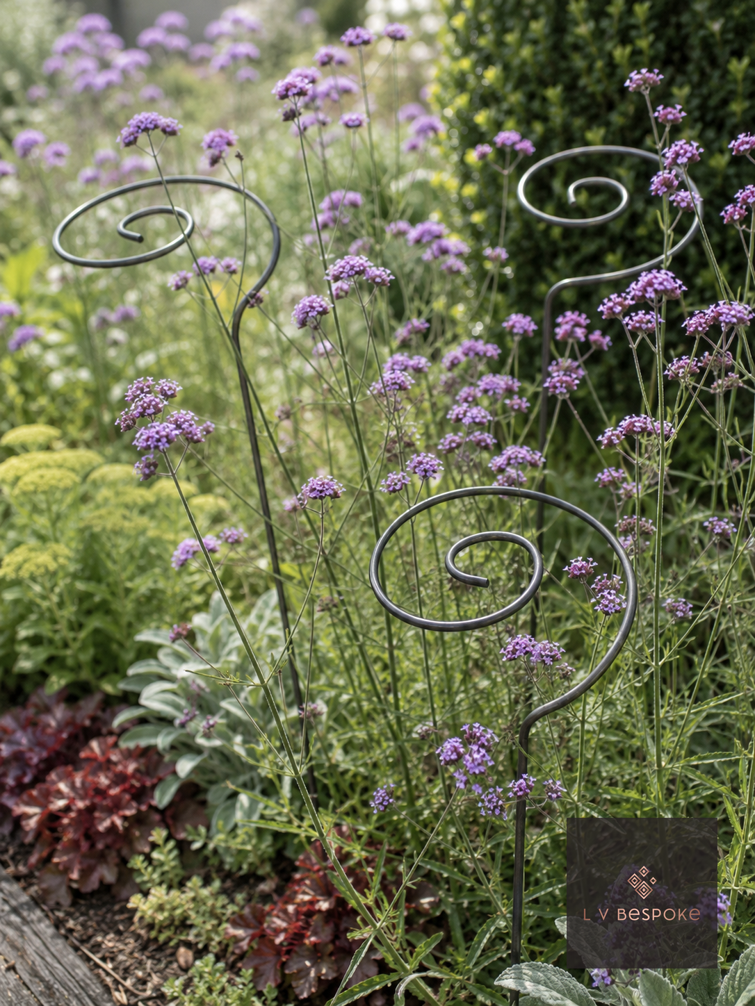 Raw steel pigtail plant support with an open spiral top