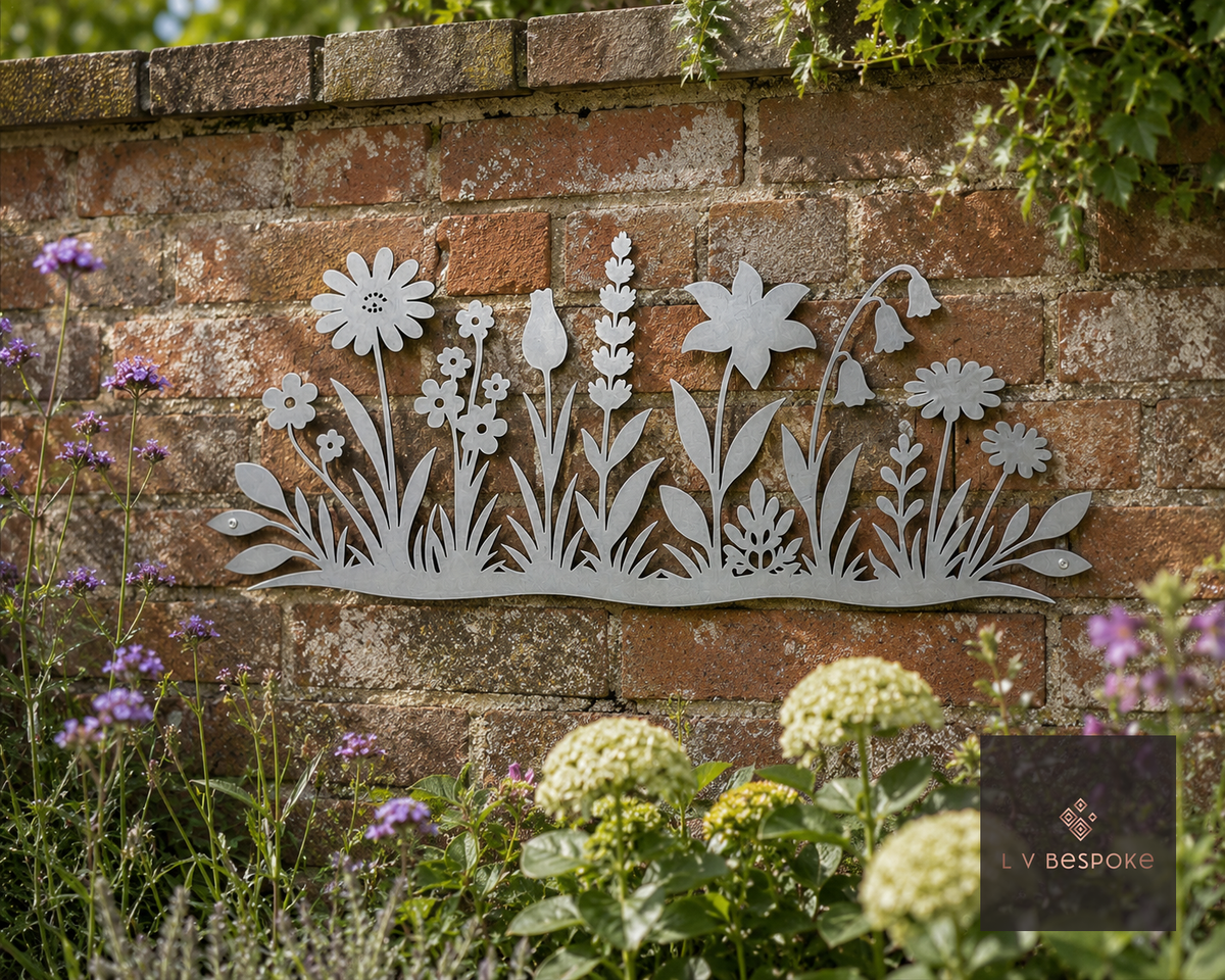 Raw steel Wildflower Meadow wall art hung on a garden wall